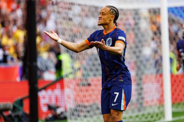 Xavi Simons, Romanya ve Hollanda milli takımları arasında Almanya 'nın Allianz Arena kentinde oynanan 16 maçlık UEFA Euro 2024 raundunda görüldü (Maciej Rogowski)