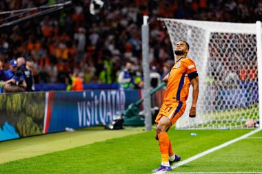 Cody Gakpo, Hollanda ve Türkiye milli takımları arasında oynanan UEFA Euro 2024 çeyrek final maçında Berlin Olimpiyat Stadyumu 'nda gol attıktan sonra kutlama yaparken görüldü (Maciej Rogowski)