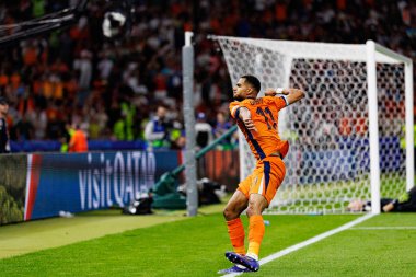 Cody Gakpo, Hollanda ve Türkiye milli takımları arasında oynanan UEFA Euro 2024 çeyrek final maçında Berlin Olimpiyat Stadyumu 'nda gol attıktan sonra kutlama yaparken görüldü (Maciej Rogowski)