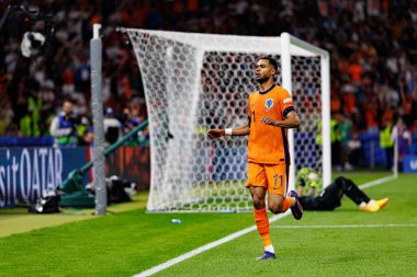 Cody Gakpo, Hollanda ve Türkiye milli takımları arasında oynanan UEFA Euro 2024 çeyrek final maçında Berlin Olimpiyat Stadyumu 'nda gol attıktan sonra kutlama yaparken görüldü (Maciej Rogowski)