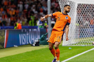 Cody Gakpo, Hollanda ve Türkiye milli takımları arasında oynanan UEFA Euro 2024 çeyrek final maçında attığı gol sonrasında Berlin, Almanya 'da kutlama yaparken görüldü (Maciej Rogowski)