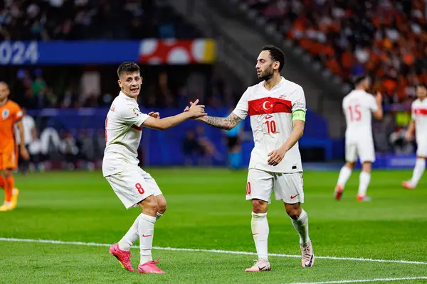 stock image Arda Guler, Hakan Calhanoglu  seen during UEFA Euro 2024 quarterfinal game between national teams of Netherlands and Turkey at Olympiastadion, Berlin (Maciej Rogowski)