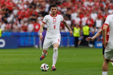 Jakub Moder UEFA Euro 2024 maçında Polonya ve Avusturya milli takımları arasında Olympiastadion, Berlin, Almanya 'da oynanan maçta (Maciej Rogowski)
