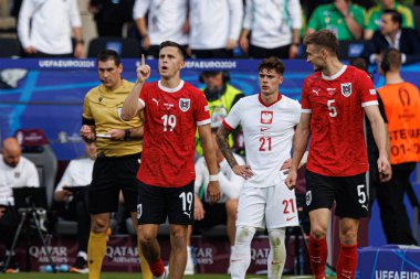 Christoph Baumgartner, Polonya ve Avusturya milli takımları arasında oynanan UEFA Euro 2024 maçında attığı gol sonrasında Almanya 'nın başkenti Berlin' de (Maciej Rogowski) kutlama yapıyor.)