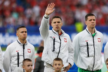 Przemyslaw Frankowski, Jan Bednarek, Wojciech Szczesny UEFA Euro 2024 maçında Polonya ve Avusturya milli takımları arasında Olympiastadion, Berlin, Almanya (Maciej Rogowski))
