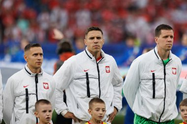 Przemyslaw Frankowski, Jan Bednarek, Wojciech Szczesny UEFA Euro 2024 maçında Polonya ve Avusturya milli takımları arasında Olympiastadion, Berlin, Almanya (Maciej Rogowski))