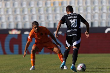 Liga Portekiz maçı sırasında Estadio Belediyesi Rio Maior 'daki Casa Pia AC ve Boavista FC takımları arasında Andre Geraldes (Maciej Rogowski)