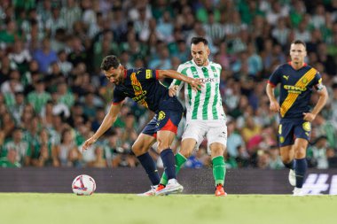 Ivan Martin, Juanmi LaLiga EASPORTS maçı sırasında Real Betis Balompie ve Girona FC takımları arasında Estadio Benito Villamarin (Maciej Rogowski)
