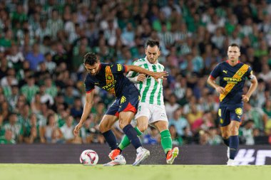 Ivan Martin, Juanmi LaLiga EASPORTS maçı sırasında Real Betis Balompie ve Girona FC takımları arasında Estadio Benito Villamarin (Maciej Rogowski)