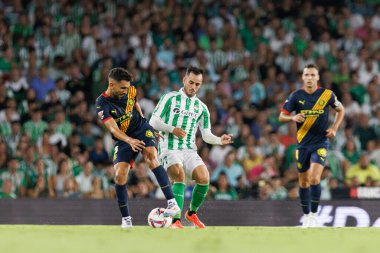 Ivan Martin, Juanmi LaLiga EASPORTS maçı sırasında Real Betis Balompie ve Girona FC takımları arasında Estadio Benito Villamarin (Maciej Rogowski)