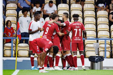 Team of Gil Vicente  seen celebrating after scored goal during Liga Portugal game between teams of Gil Vicente FC and AVS  at Estadio Cidade de Barcelos (Maciej Rogowski) clipart