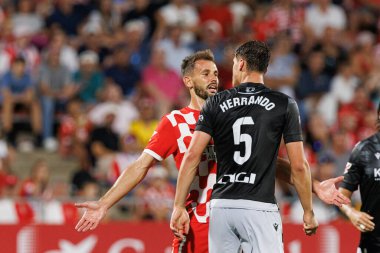 Cristhian Stuani, Jorge Herrando LaLiga EA Spor Maçı sırasında Girona FC ve CA Osasuna takımları arasında Estadi Montilivi 'de görüldü (Maciej Rogowski)