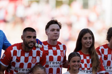 David Lopez, Viktor Tsygankov LaLiga EA SPORTS maçı sırasında Estadi Montilivi 'de Girona FC ve CA Osasuna takımları arasında görüldü (Maciej Rogowski)