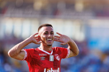 Ricardinho, Estadio Belediyesi Rio Maior 'da (Maciej Rogowski) Casa Pia AC ve CD Santa Clara takımları arasında oynanan Liga Portekiz maçında gol attıktan sonra kutlama yaparken görüldü.)