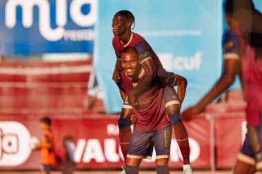 Vando Felix, Liga Portekiz Torreense ve Portimonense SC (Maciej Rogowski) takımları arasında oynanan 2 maçta Dani Bolt ile gol attıktan sonra kutlama yaparken görüldü.)