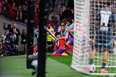 Atletico takımı, Atletico de Madrid ve Red Bull Leipzig (Maciej Rogowski) takımları arasında oynanan UEFA Şampiyonlar Ligi maçında attığı gol sonrasında Jose Maria Gimenez ile kutlama yaparken görüldü.)