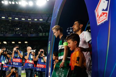 Morten Hjulmand, Benjamin Andre seen during UEFA Champions League game between teams of Sporting CP and LOSC Lille (Maciej Rogowski)  clipart