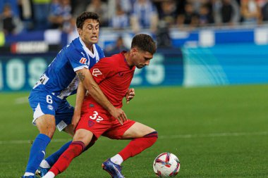 Ander Guevara, Jose Angel Carmona, Estadio Mendizorroza 'da Deportivo Alaves ve Sevilla FC takımları arasında oynanan LaLiga EA SPORTS maçı sırasında görüldü (Maciej Rogowski)