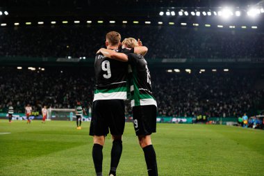 Viktor Gyokeres seen celebrating after scoring goal  with Conrad Harder during Liga Portugal game between teams of Sporting CP and AVS Futebol SAD at Estadio Jose Alvalade (Maciej Rogowski) clipart