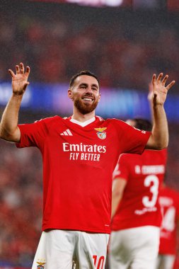 Orkun Kokcu, SL Benfica ve Atletico de Madrid (Maciej Rogowski) takımları arasındaki UEFA Şampiyonlar Ligi maçında gol attıktan sonra kutlama yaparken görüldü.)