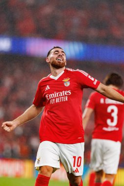 Orkun Kokcu, SL Benfica ve Atletico de Madrid (Maciej Rogowski) takımları arasındaki UEFA Şampiyonlar Ligi maçında gol attıktan sonra kutlama yaparken görüldü.)