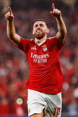 Orkun Kokcu, SL Benfica ve Atletico de Madrid (Maciej Rogowski) takımları arasındaki UEFA Şampiyonlar Ligi maçında gol attıktan sonra kutlama yaparken görüldü.)