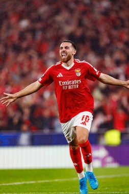 Orkun Kokcu, SL Benfica ve Atletico de Madrid (Maciej Rogowski) takımları arasındaki UEFA Şampiyonlar Ligi maçında gol attıktan sonra kutlama yaparken görüldü.)