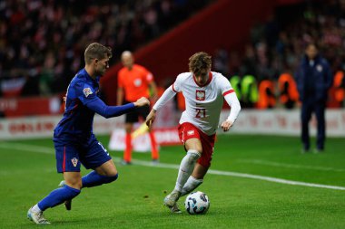 Luka Suciç ve Nicola Zalewski, Polonya ve Hırvatistan milli takımları arasında oynanan UEFA Uluslar Ligi maçında PGE Narodowy 'de (Maciej Rogowski)