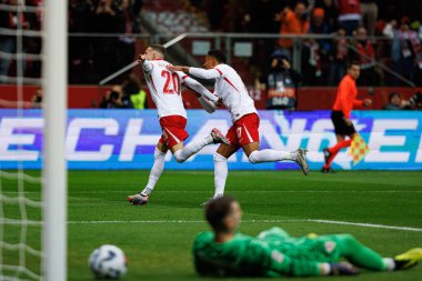 Sebastian Szymanski, PGE Narodowy 'de (Maciej Rogowski) Polonya ve Hırvatistan milli takımları arasında oynanan UEFA Milletler Ligi maçında gol attıktan sonra kutlama yaparken görüldü.)