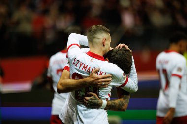 Sebastian Szymanski, PGE Narodowy 'de (Maciej Rogowski) Polonya ve Hırvatistan milli takımları arasında oynanan UEFA Milletler Ligi maçında gol attıktan sonra kutlama yaparken görüldü.)