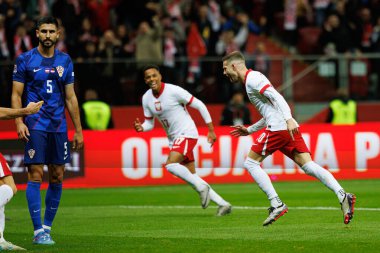 Sebastian Szymanski, PGE Narodowy 'de (Maciej Rogowski) Polonya ve Hırvatistan milli takımları arasında oynanan UEFA Milletler Ligi maçında gol attıktan sonra kutlama yaparken görüldü.)