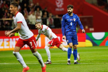 Sebastian Szymanski, PGE Narodowy 'de (Maciej Rogowski) Polonya ve Hırvatistan milli takımları arasında oynanan UEFA Milletler Ligi maçında gol attıktan sonra kutlama yaparken görüldü.)