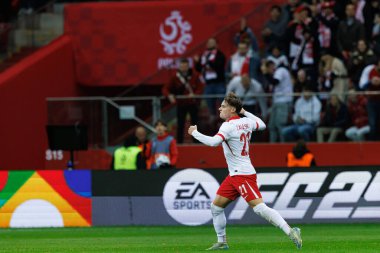 Nicola Zalewski, Polonya ve Hırvatistan milli takımları arasında oynanan UEFA Milletler Ligi maçında attığı golün ardından PGE Narodowy 'de (Maciej Rogowski)