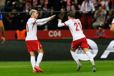 Jakub Kaminski ve Nicola Zalewski, Polonya ve Hırvatistan milli takımları arasında PGE Narodowy 'de oynanan UEFA Milletler Ligi maçında gol attıktan sonra kutlama yaparken görüldü (Maciej Rogowski)