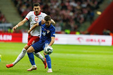 Jan Bednarek, Martin Baturina UEFA Uluslar Ligi maçında Polonya ve Hırvatistan milli takımları arasında PGE Narodowy 'da görüldü (Maciej Rogowski)