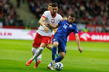 Jan Bednarek, Martin Baturina UEFA Uluslar Ligi maçında Polonya ve Hırvatistan milli takımları arasında PGE Narodowy 'da görüldü (Maciej Rogowski)