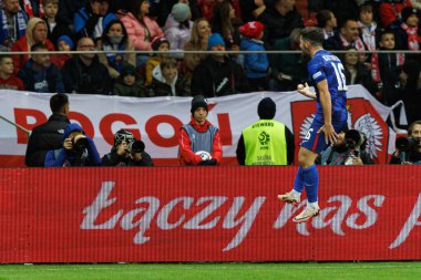 Martin Baturina, Polonya ve Hırvatistan milli takımları arasında PGE Narodowy 'de oynanan UEFA Milletler Ligi maçında gol attıktan sonra kutlama yaparken görüldü (Maciej Rogowski)