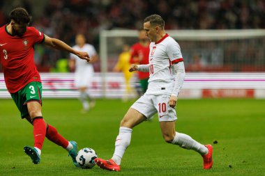 Ruben Dias, Piotr Zielinski, Polonya ve Portekiz milli takımları arasında oynanan UEFA Uluslar Ligi maçında PGE Narodowy 'de (Maciej Rogowski)
