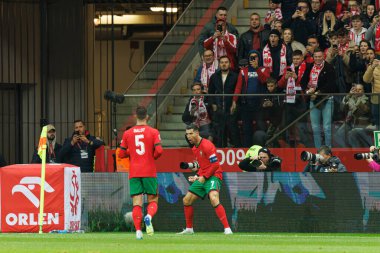 Cristiano Ronaldo, PGE Narodowy (Maciej Rogowski) 'de Polonya ve Portekiz milli takımları arasında oynanan UEFA Milletler Ligi maçında gol attıktan sonra kutlama yaparken görüldü.)