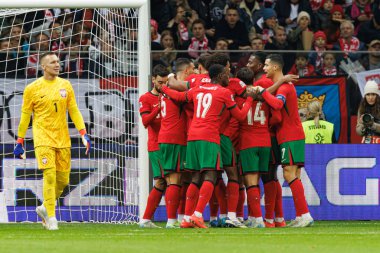 Portekizli oyuncular, PGE Narodowy 'de Polonya ve Portekiz milli takımları arasında oynanan UEFA Milletler Ligi maçında gol attıktan sonra kutlama yaparken görüldü (Maciej Rogowski)