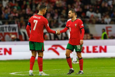 Cristiano Ronaldo, Bernardo Silva, PGE Narodowy (Maciej Rogowski) 'de Polonya ve Portekiz milli takımları arasındaki UEFA Milletler Ligi maçında gol attıktan sonra kutlama yaparken görüldü.)