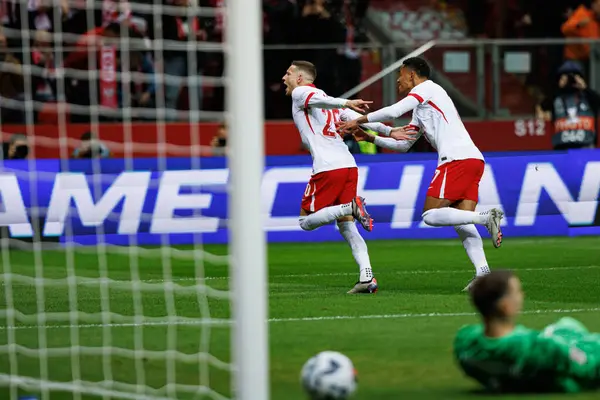 Sebastian Szymanski, PGE Narodowy 'de (Maciej Rogowski) Polonya ve Hırvatistan milli takımları arasında oynanan UEFA Milletler Ligi maçında gol attıktan sonra kutlama yaparken görüldü.)