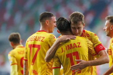 İsa İmaz, Taras Romanczuk, Stadyum Zaglebia Lubin 'de (Maciej Rogowski) Zaglebie Lubin ve Jagiellonia Bialystok takımları arasında oynanan PKO BP Ekstraklasa maçında gol attıktan sonra kutlama yaparken görüldü.)