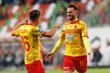 İsa İmaz, Michal Sacek, Stadyum Zaglebia Lubin 'deki Zaglebie Lubin ve Jagiellonia Bialystok takımları arasında oynanan PKO BP Ekstraklasa maçında gol attıktan sonra kutlama yaparken görüldü (Maciej Rogowski)