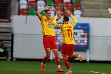 Jesus Imaz ve Darko Churlinov, Stadion Zaglebia Lubin 'deki Zaglebie Lubin ve Jagiellonia Bialystok takımları arasında oynanan PKO BP Ekstraklasa maçında gol üstüne gol attılar.)