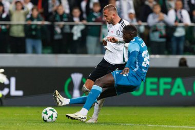 Tomas Pekhart, Nobel Mendy, UEFA Avrupa Konferans Ligi maçında Stadion Miejski Legii Warszawa 'daki Legia Warszawa ve Real Betis Balompie takımları arasında görüldü (Maciej Rogowski)
