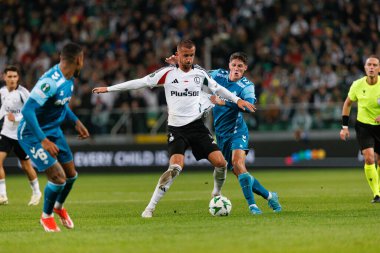 Tomas Pekhart, Sergi Altimira UEFA Avrupa Konferans Ligi maçında Stadion Miejski Legii Warszawa 'da Legia Warszawa ve Real Betis Balompie takımları arasında görüldü (Maciej Rogowski)