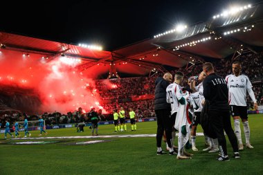 Pyrotechnics of Legia fans seen during UEFA Europa Conference League game between teams of  Legia Warszawa and Real Betis Balompie  at Stadion Miejski Legii Warszawa (Maciej Rogowski) clipart