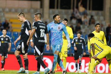 Estadio Belediyesi Rio Maior 'daki (Maciej Rogowski) Casa Pia ve CD Nacional takımları arasında oynanan Liga Portekiz maçı sırasında her iki takımın oyuncuları)