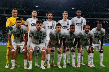 Team of Estrela Amadora seen during Liga Portugal game between teams of Sporting CP and CF Estrela Amadora at Estadio Jose Alvalade (Maciej Rogowski) clipart